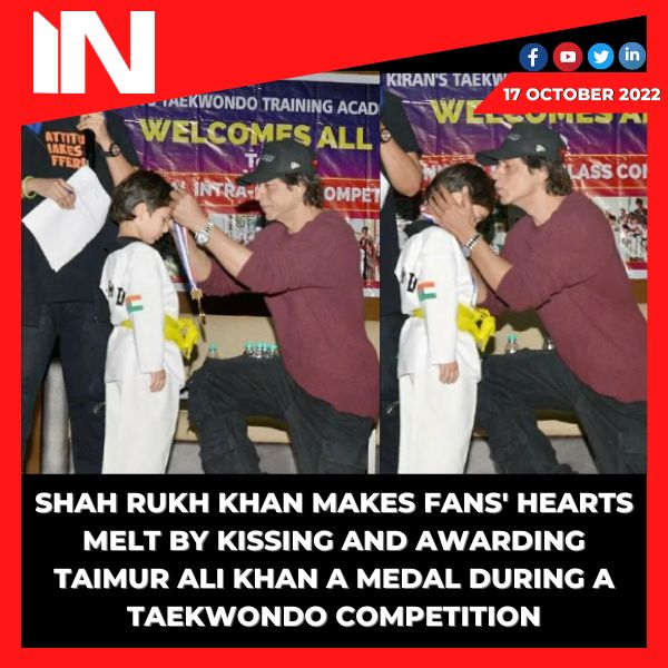 Shah Rukh Khan makes fans’ hearts melt by kissing and awarding Taimur Ali Khan a medal during a Taekwondo competition.