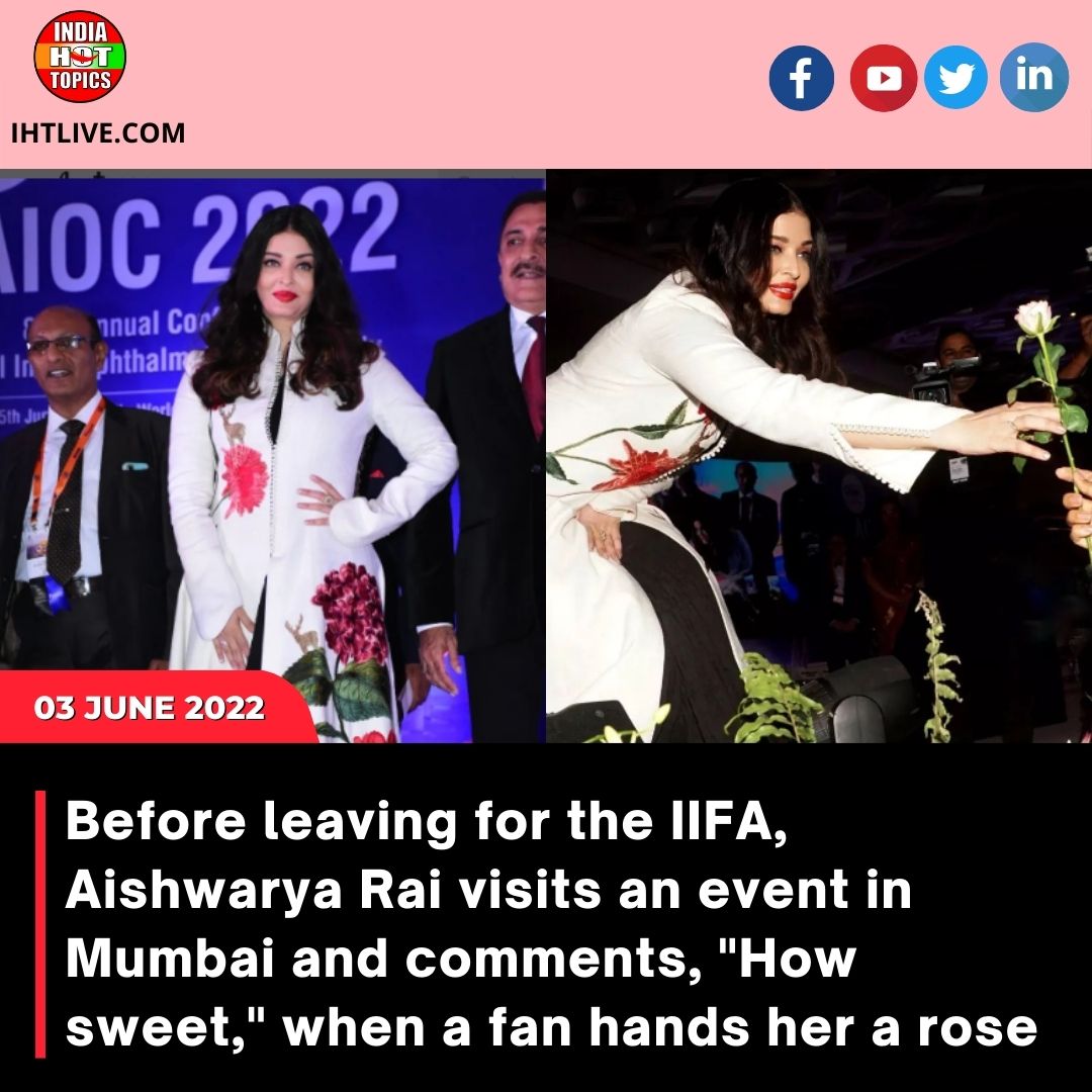 Before leaving for the IIFA, Aishwarya Rai visits an event in Mumbai and comments, “How sweet,” when a fan hands her a rose.