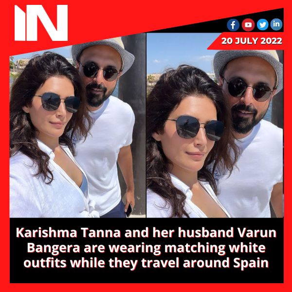 Karishma Tanna and her husband Varun Bangera are wearing matching white outfits while they travel around Spain