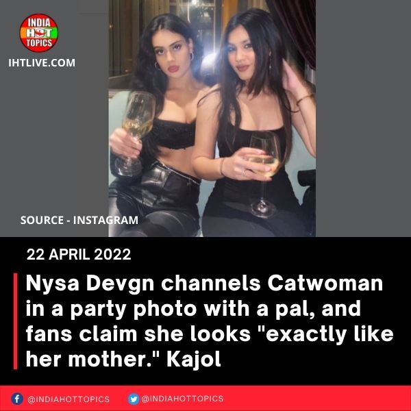 Nysa Devgn channels Catwoman in a party photo with a pal, and fans claim she looks “exactly like her mother.” Kajol