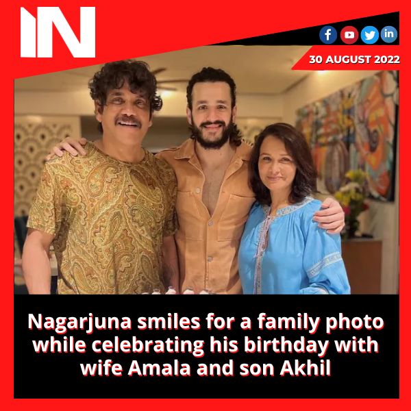 Nagarjuna smiles for a family photo while celebrating his birthday with wife Amala and son Akhil