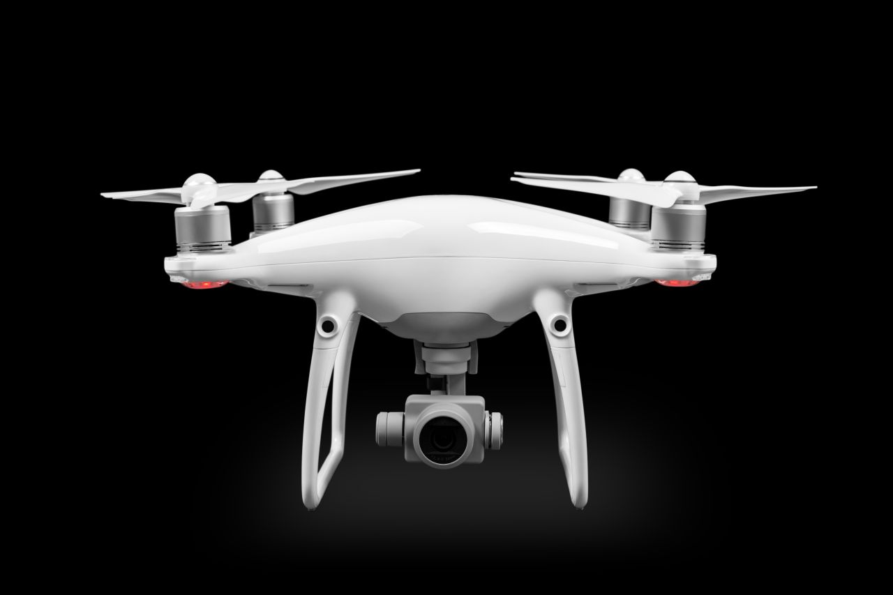 white-drone-isolated-black-background